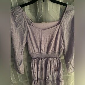 Size Large ruffle dress nice fit belo  the knee.